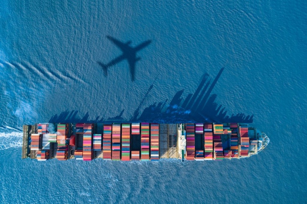 Container ship with cargo containers on open water